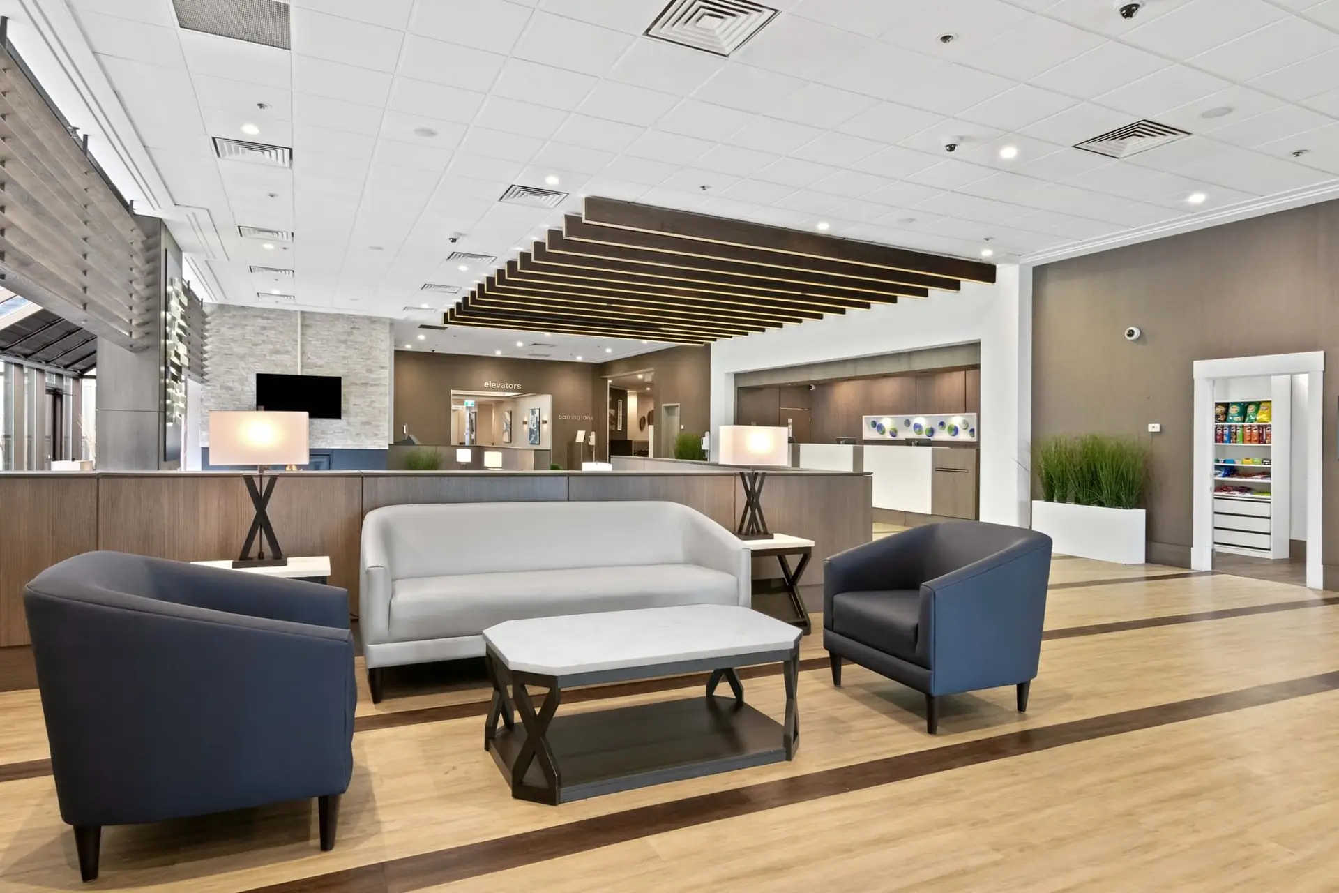 Front desk and lobby seating at the Calgary Plaza Hotel & Conference Centre