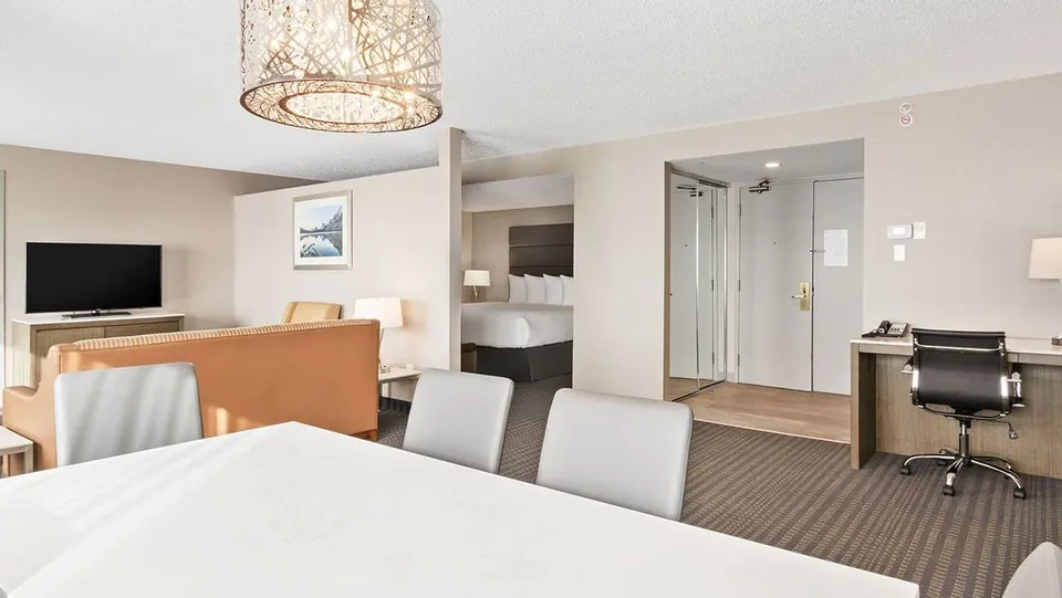 Dining area in a Suite at Best Western Premier Calgary Plaza Hotel