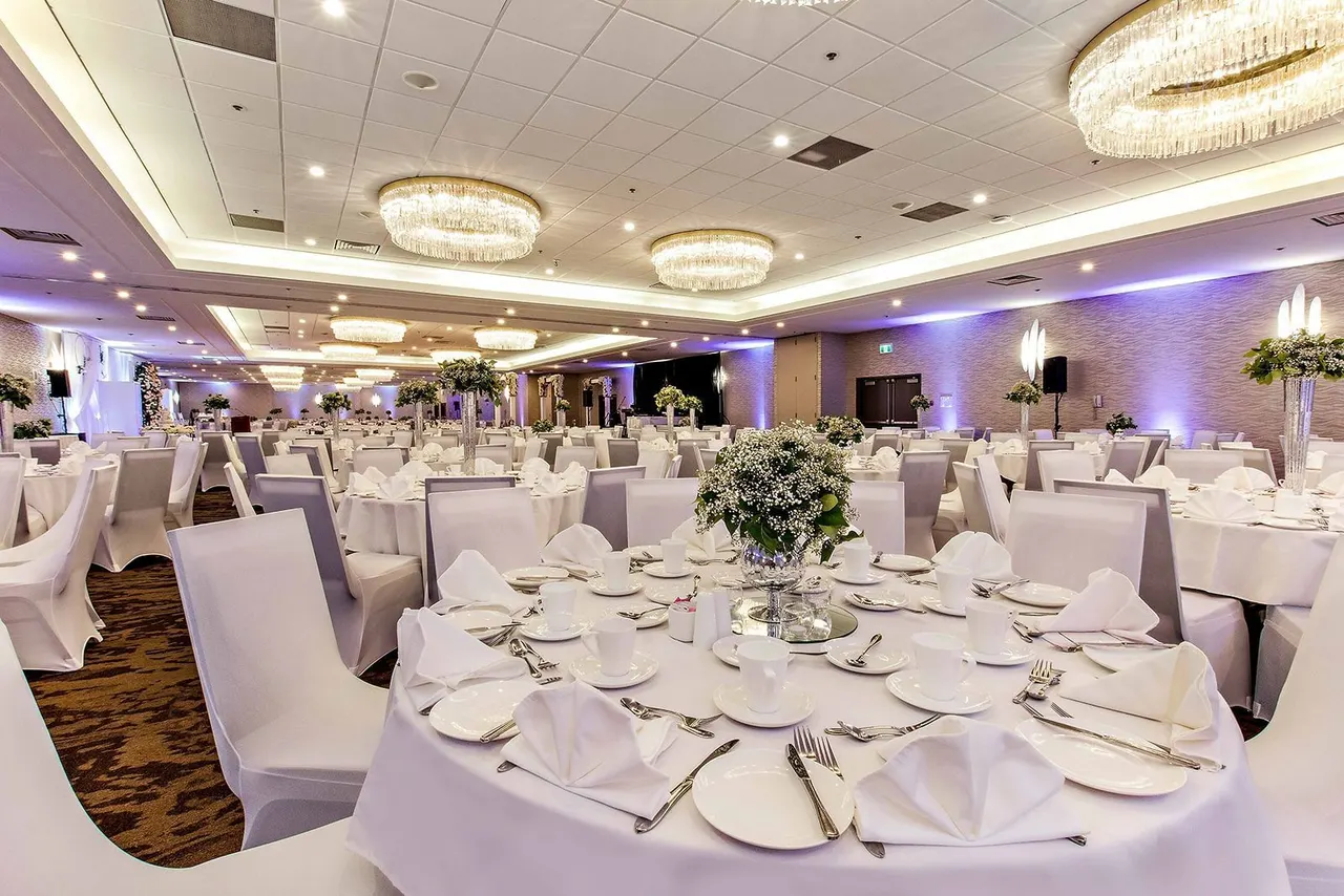 Banquet table décor in a ballroom at the Best Western Premier Calgary Plaza Hotel